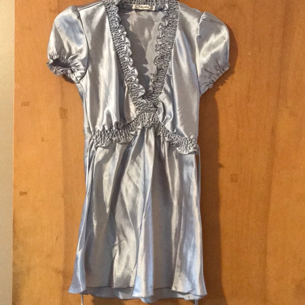 Silky silver top with ruffle neckline, size S